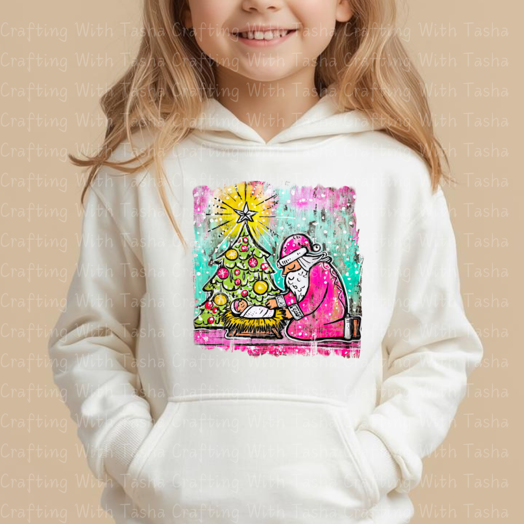 Pink Santa Kneeling at the Manger – Christmas Nativity DTF Transfer | Baby Jesus & Tree Holiday Design