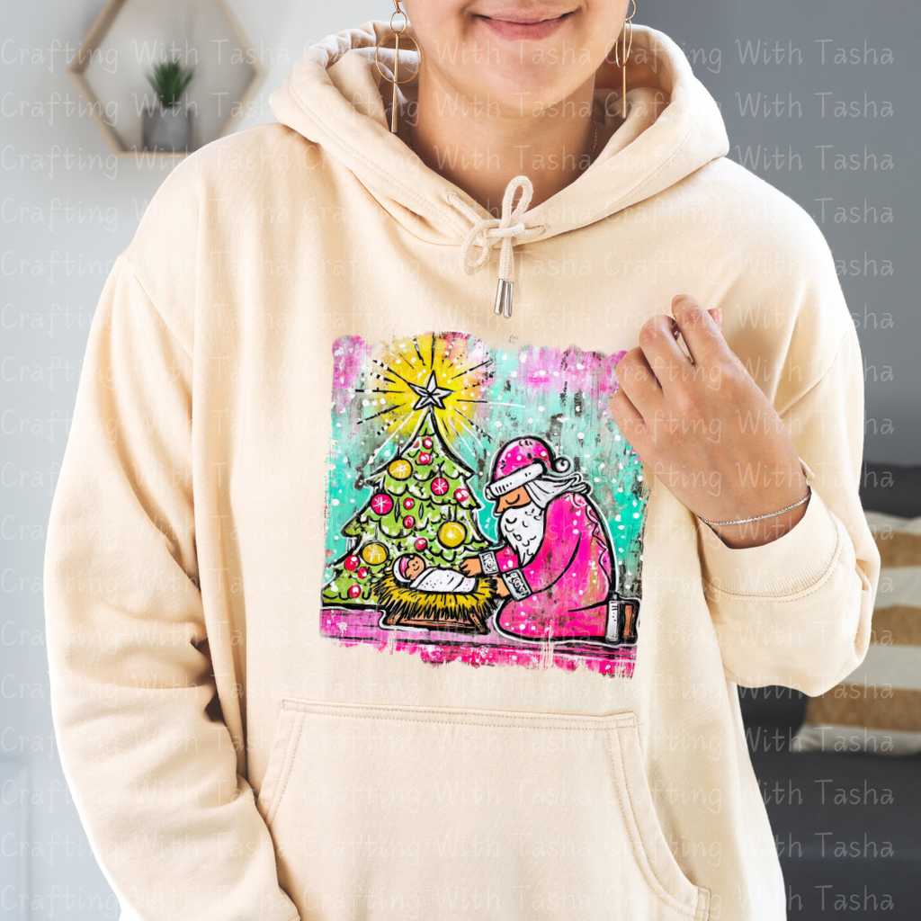 Pink Santa Kneeling at the Manger – Christmas Nativity DTF Transfer | Baby Jesus & Tree Holiday Design