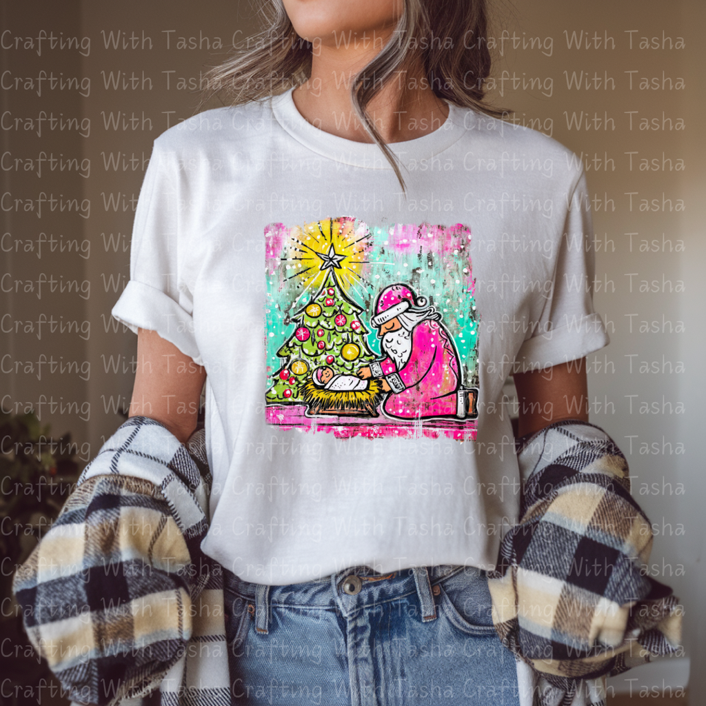 Pink Santa Kneeling at the Manger – Christmas Nativity DTF Transfer | Baby Jesus & Tree Holiday Design