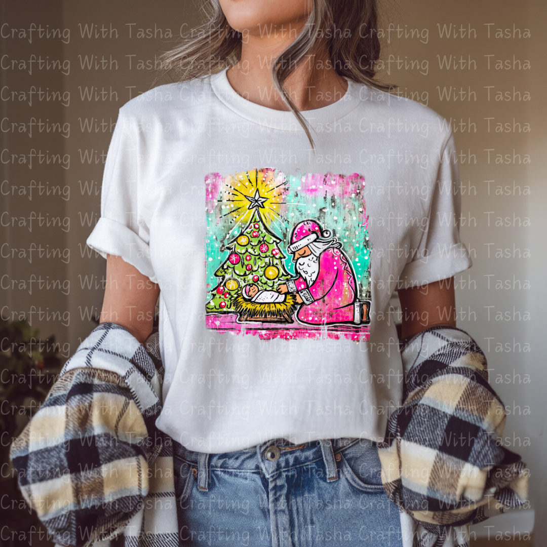 Pink Santa Kneeling at the Manger – Christmas Nativity DTF Transfer | Baby Jesus & Tree Holiday Design