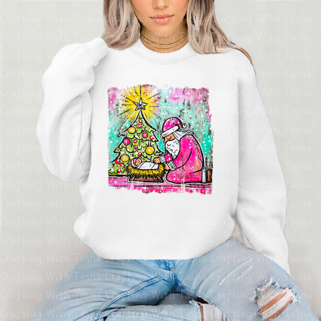 Pink Santa Kneeling at the Manger – Christmas Nativity DTF Transfer | Baby Jesus & Tree Holiday Design