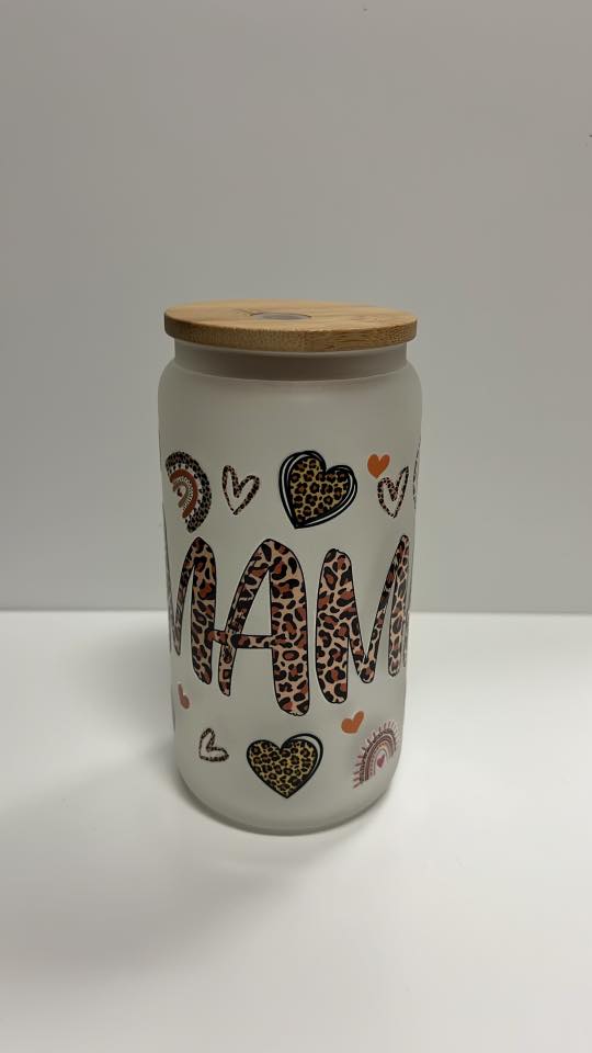 White jar with 'MAMA' text and heart designs on a white background