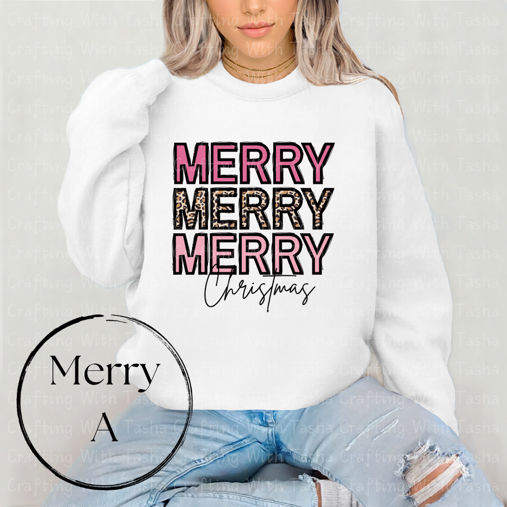 Person wearing a white sweatshirt with 'Merry Merry Merry Christmas' text.